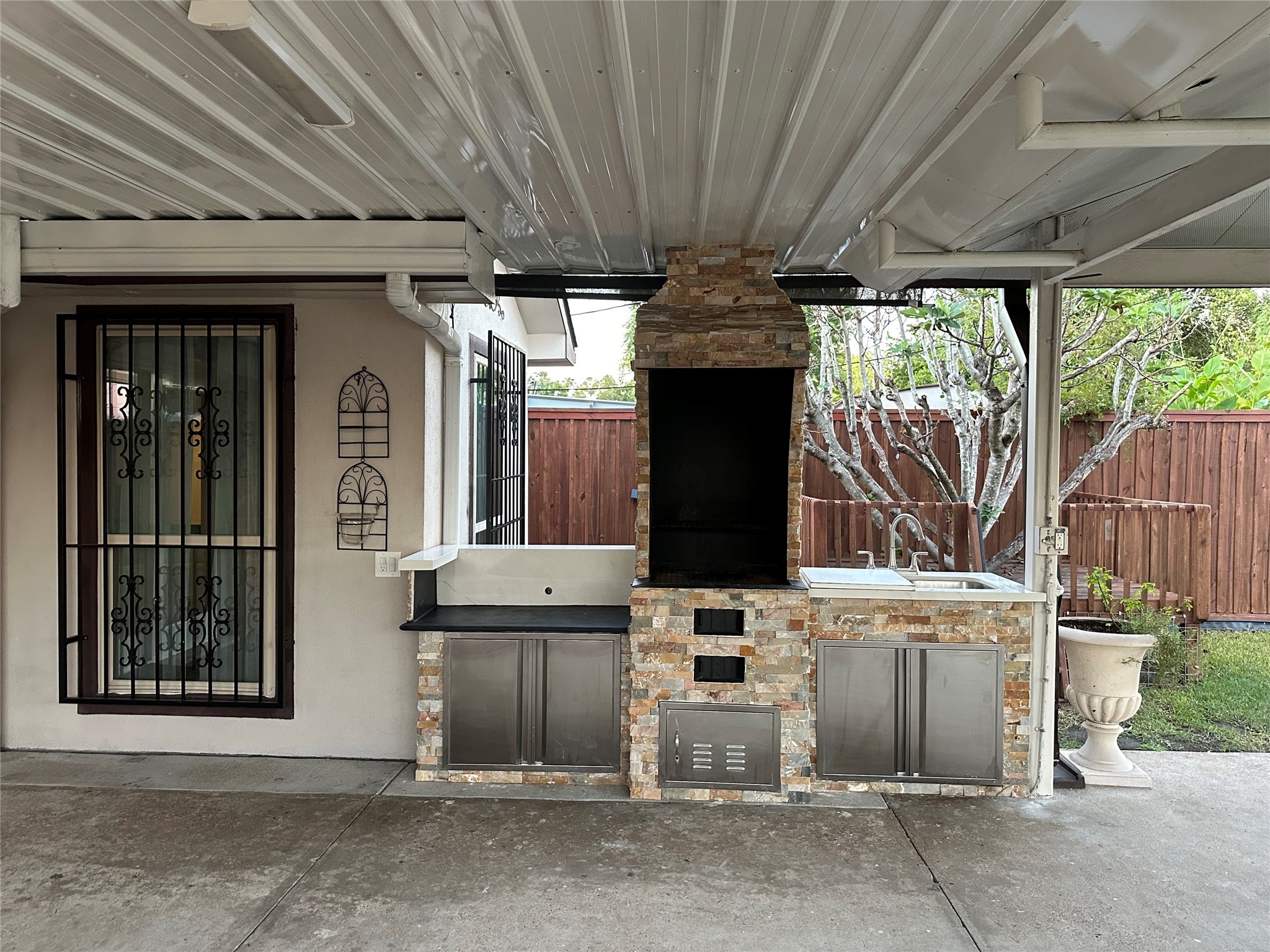 14007 Buffalo Speedway Houston, TX 77045 - Photo 46 of 46 a view of a porch with furniture