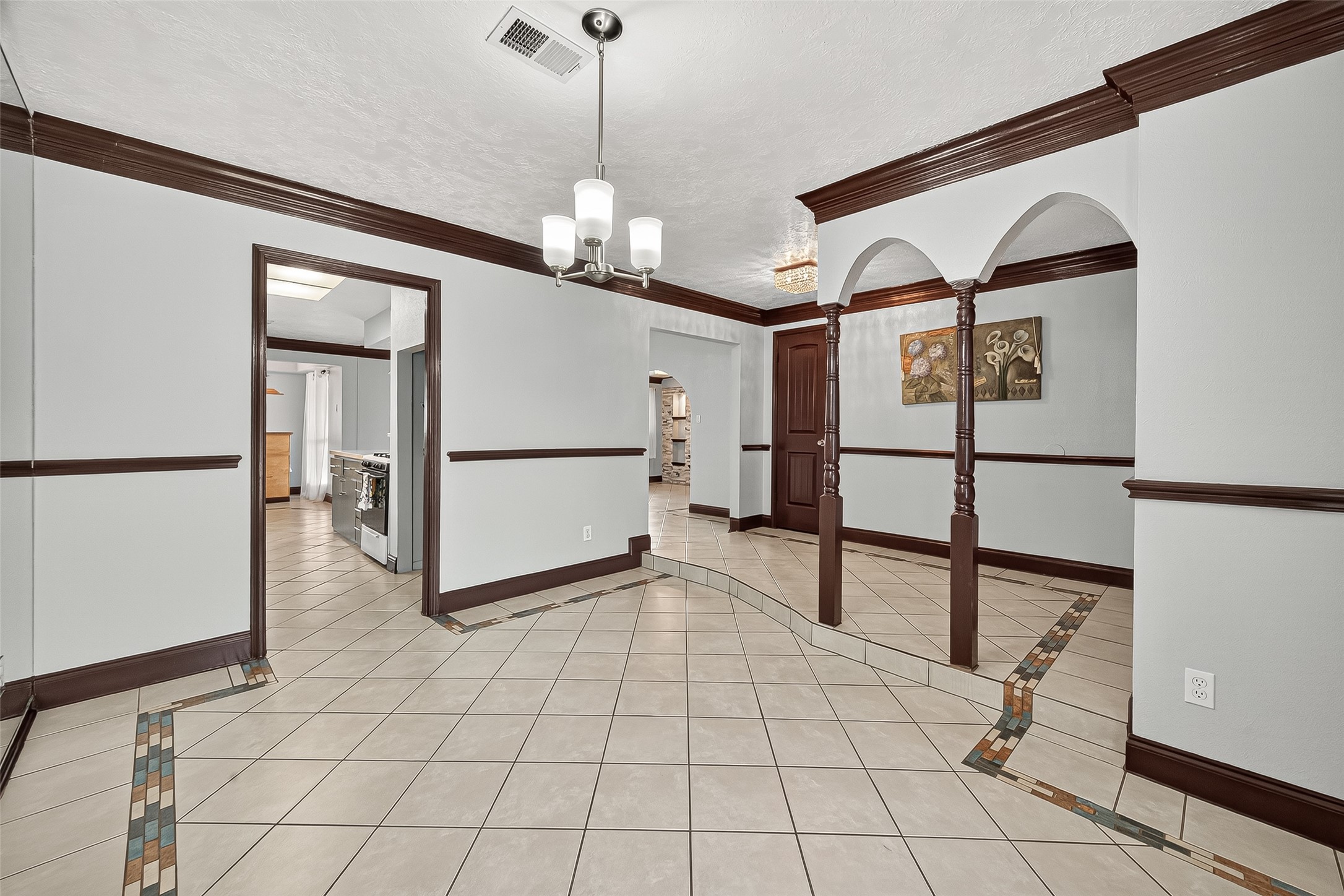14007 Buffalo Speedway Houston, TX 77045 - Photo 9 of 46 a view of a livingroom with furniture and a hallway
