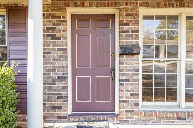 a view of a brick building with a window