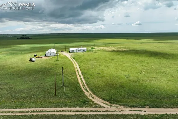 a view of a golf course with a wooden floor