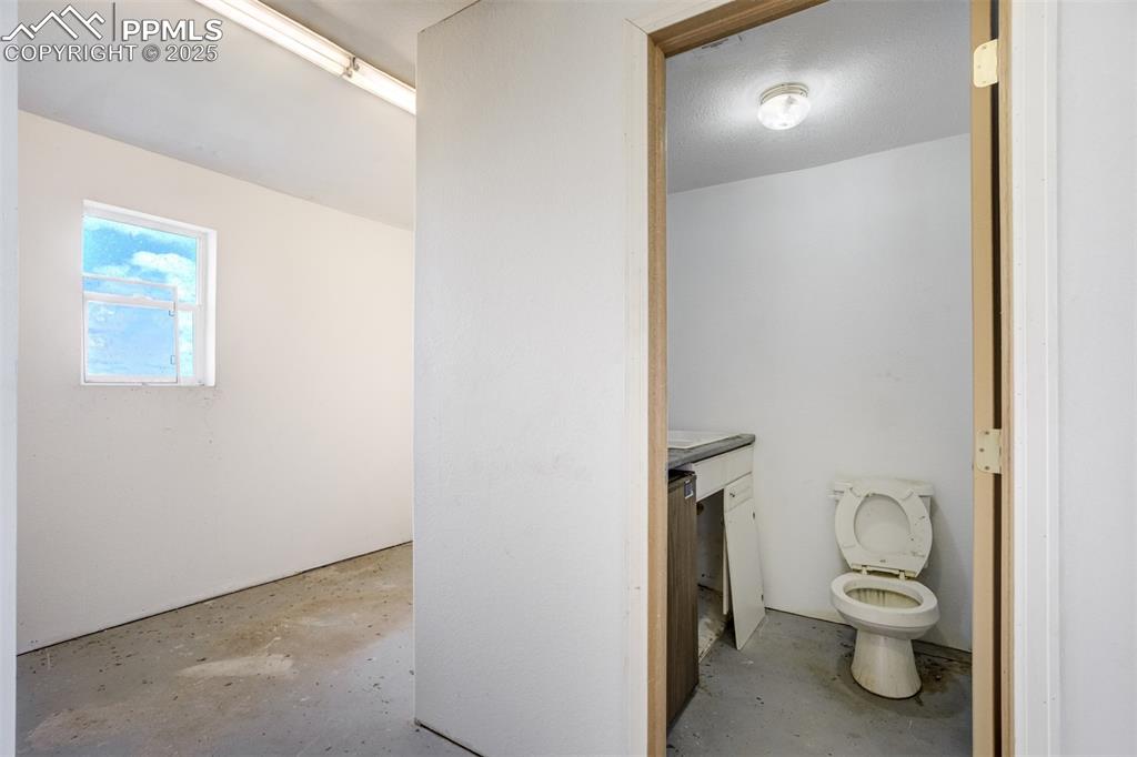 1435 Equestrian Point Yoder, CO 80864 - Photo 39 of 49 a bathroom with a toilet