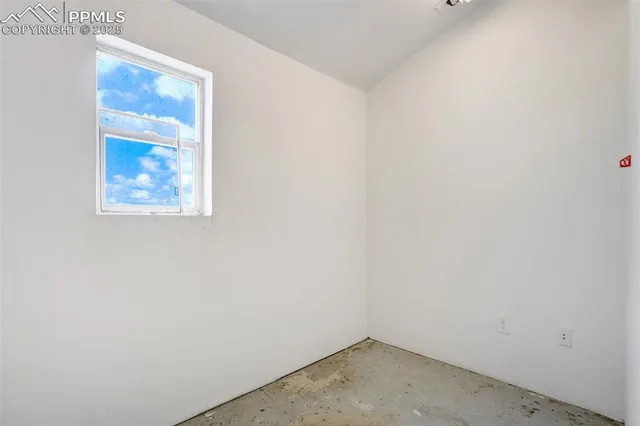 a view of parking garage with stairs
