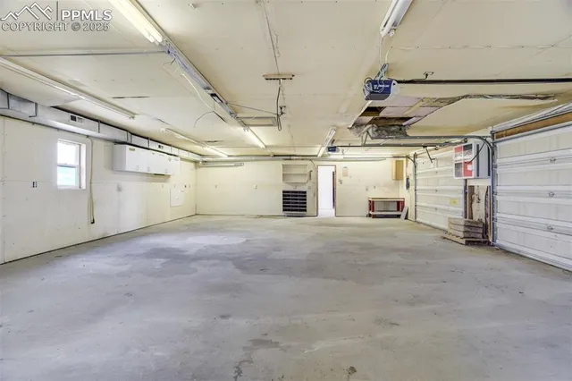 a view of a field with an ocean