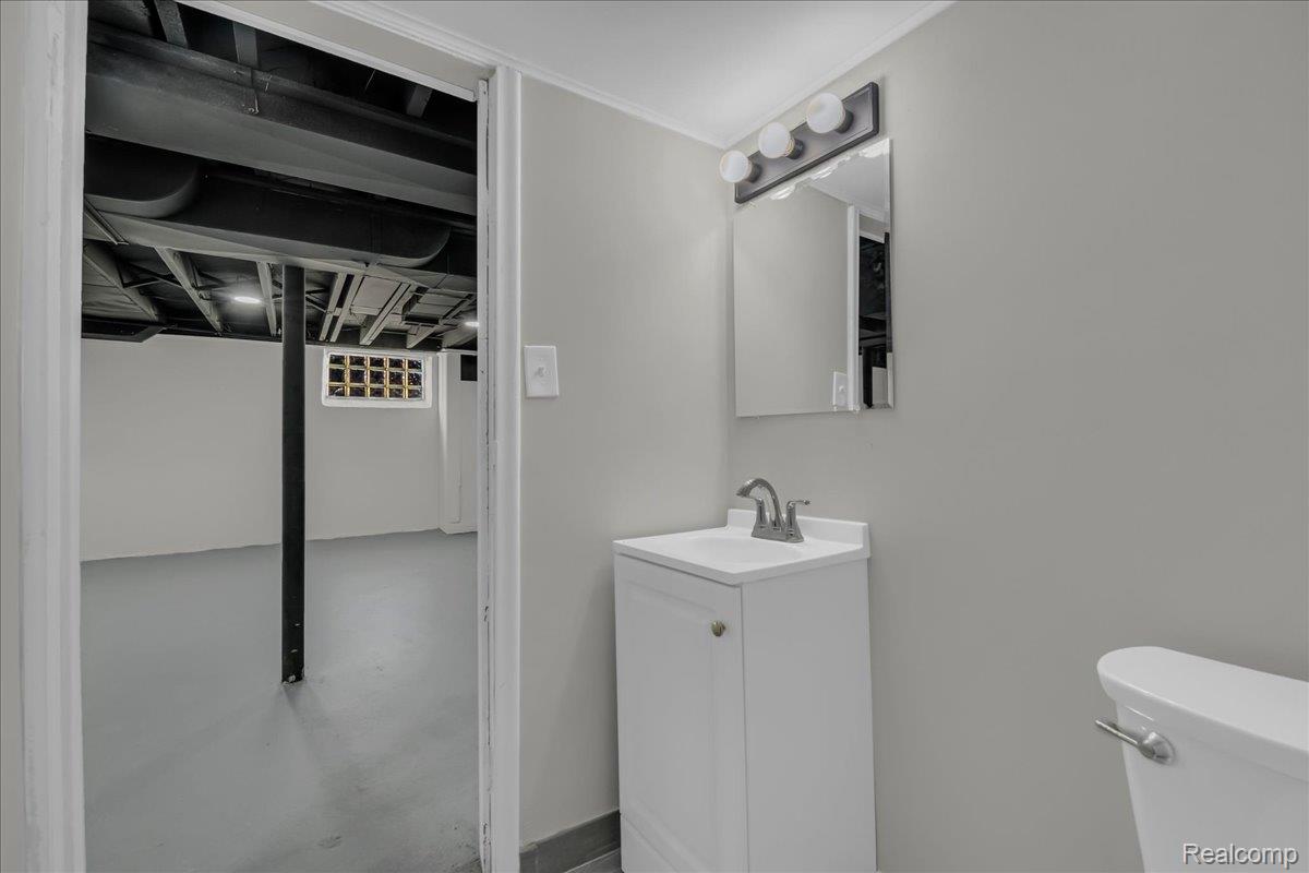 16717 Fielding Street Detroit, MI 48219 - Photo 42 of 46 Bathroom featuring vanity and concrete floors