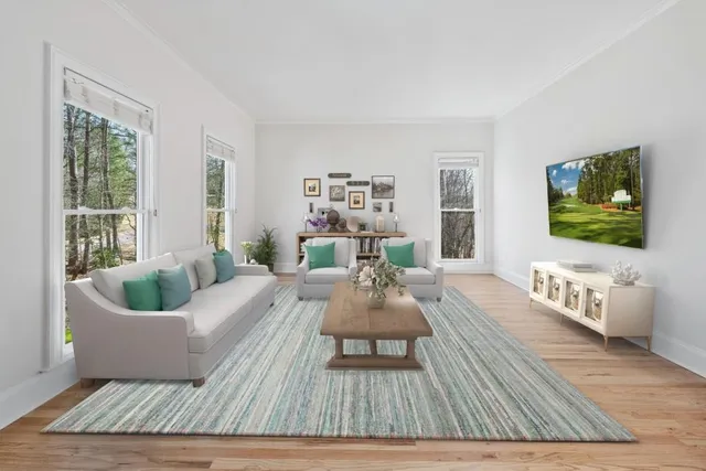 a view of entryway with wooden floor and stairs