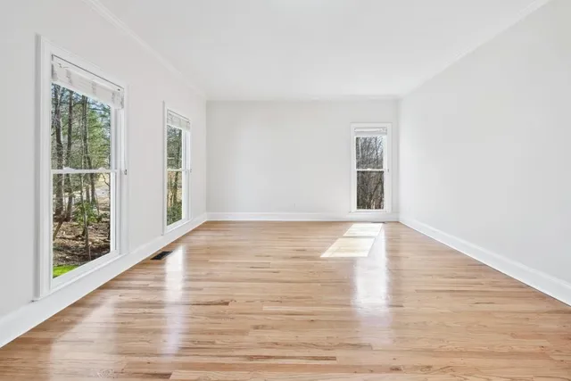 a kitchen with a stove a sink and a refrigerator