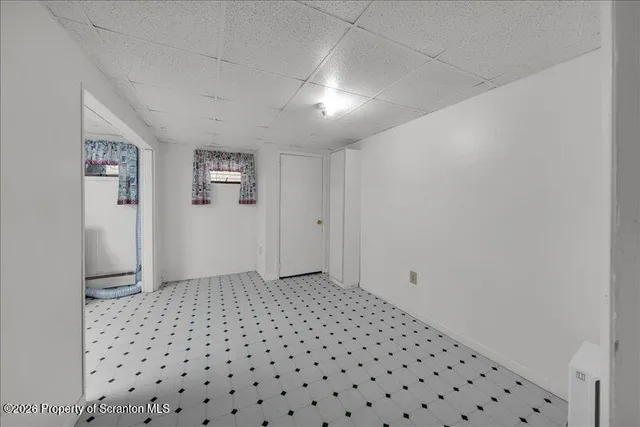 a kitchen with a refrigerator a stove top oven a sink and dishwasher