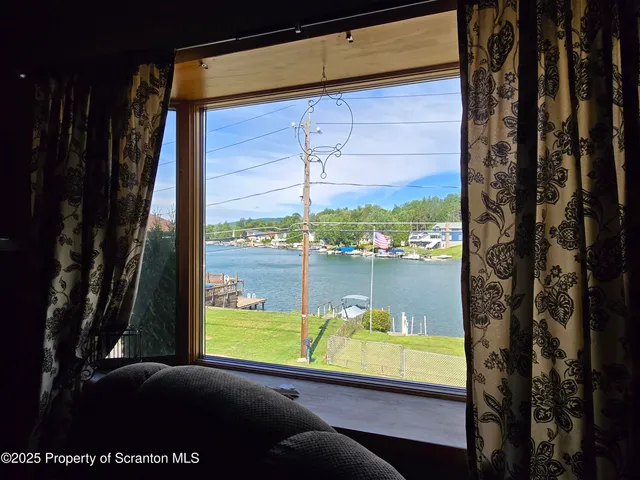 a view of swimming pool from a window