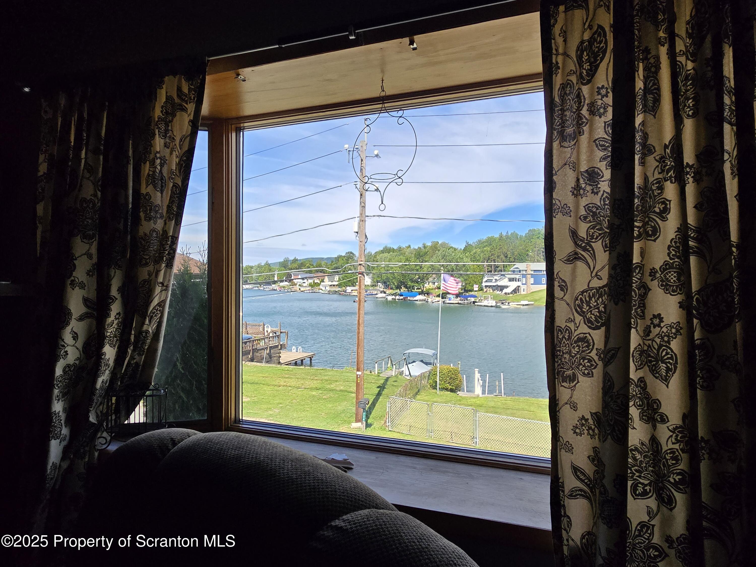 1228 Lake Road Factoryville, PA 18419 - Photo 15 of 31 a view of swimming pool from a window
