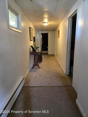 a view of a hallway with workspace