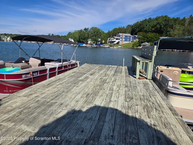 a view of a balcony with chairs