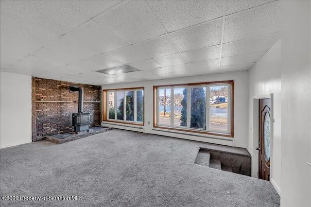 an empty room with windows