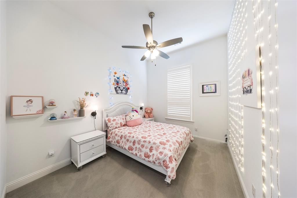 1650 Oakcrest Drive Prosper, TX 75078 - Photo 29 of 40 Carpeted bedroom featuring ceiling fan and baseboards
