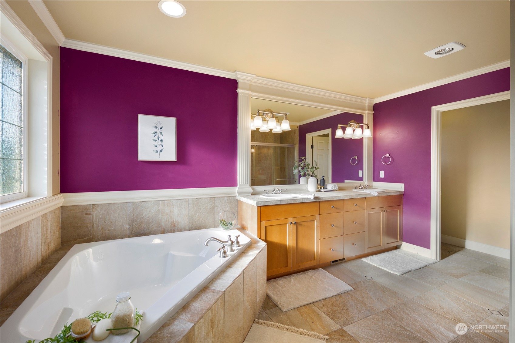 20278 86th Place Northeast Bothell, WA 98011 - Photo 25 of 34 a bathroom with a bathtub a sink and a large mirror