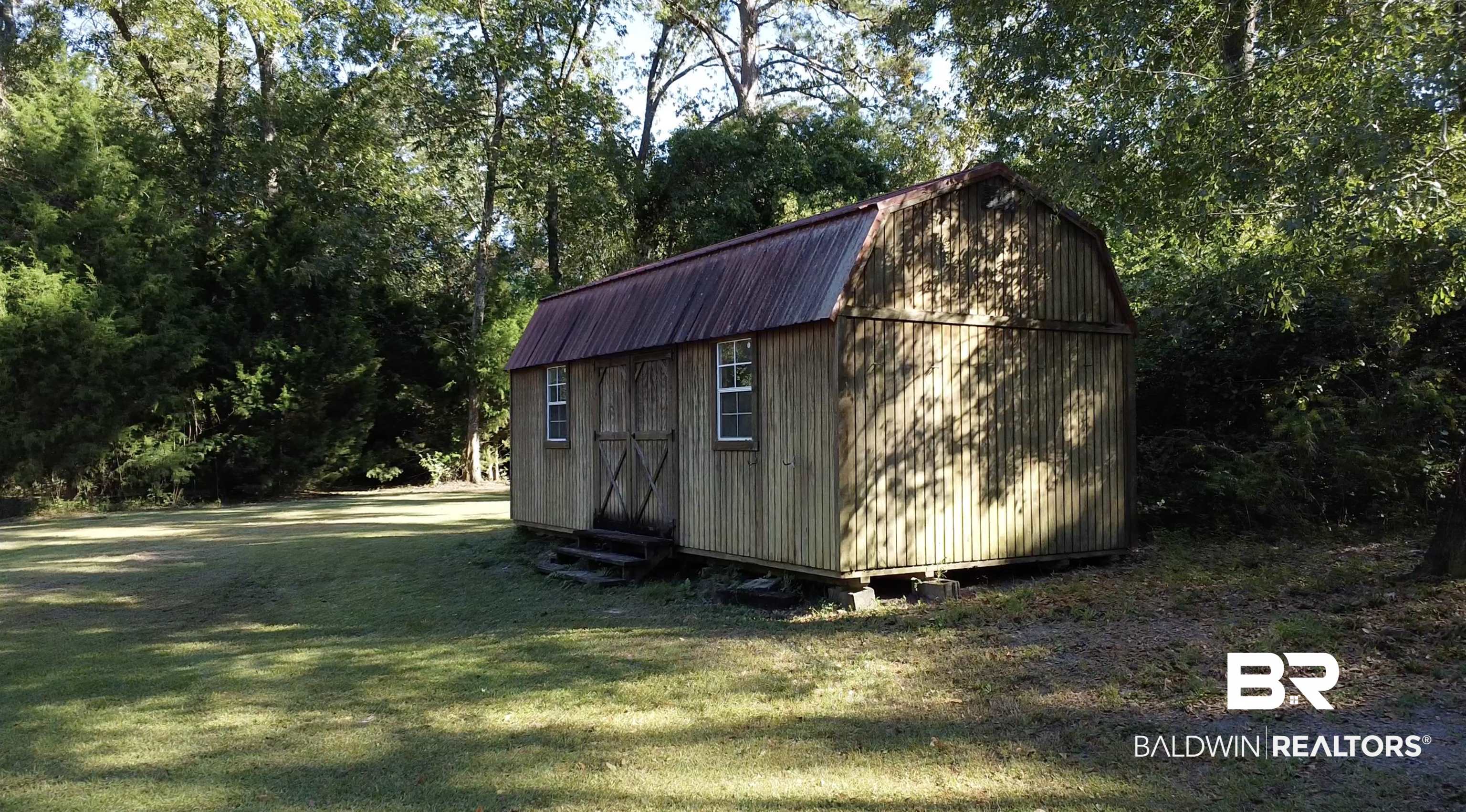 10846 County Road 138 Bay Minette, AL 36507 - Photo 53 of 53 View of outdoor structure featuring a lawn