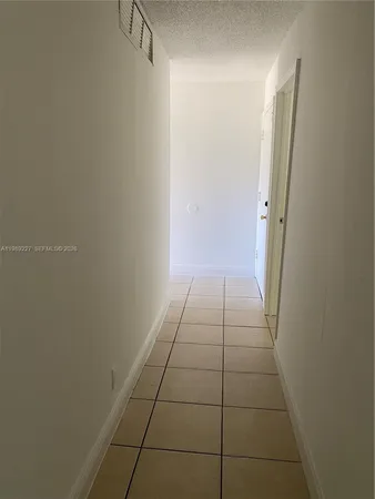 a bathroom with a vanity and a shower