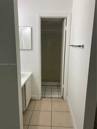 a view of a small space with a fan