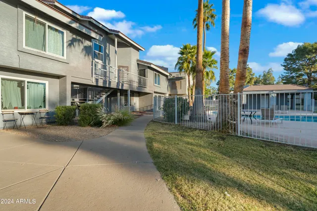 a view of a house with a swimming pool