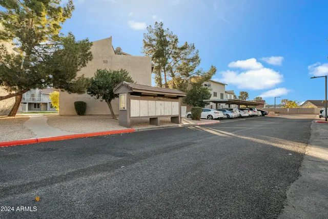 a view of street with large building