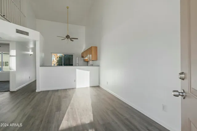 a view of a kitchen cabinets and wooden floor