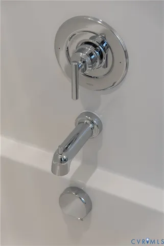 a kitchen with stainless steel appliances granite countertop a stove and a microwave