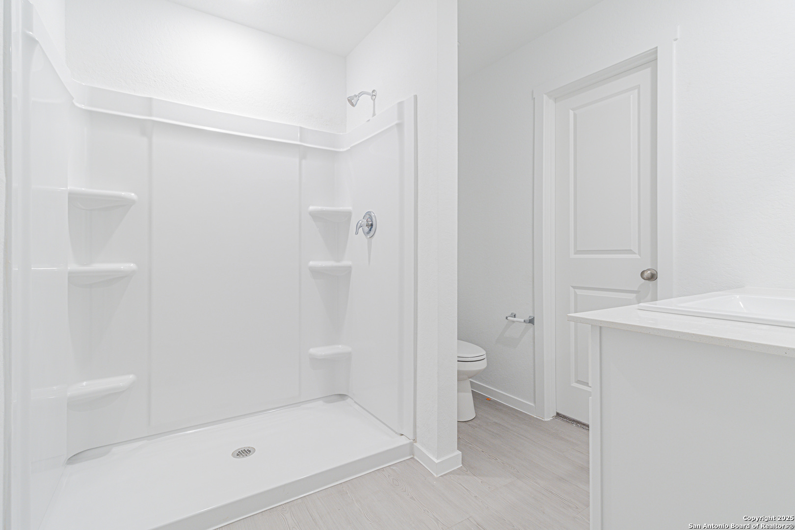 308 Kayden Court Marion, TX 78124 - Photo 12 of 23 a bathroom with a shower and a toilet