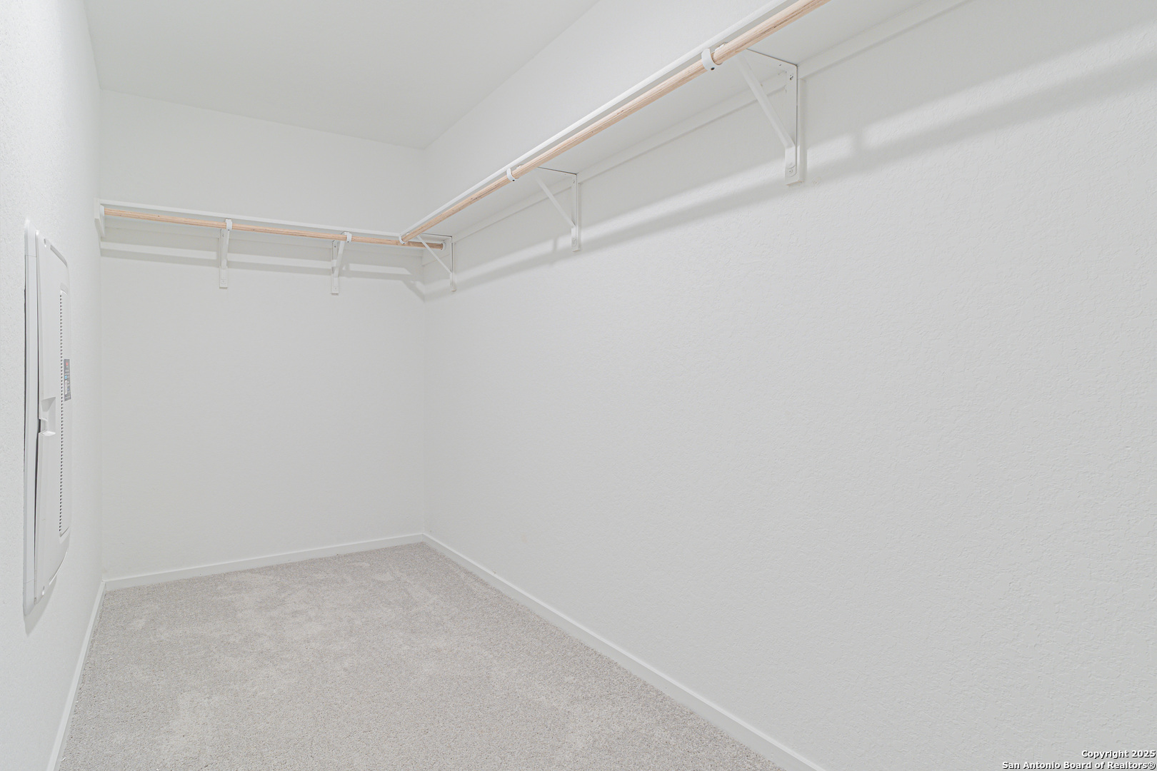 308 Kayden Court Marion, TX 78124 - Photo 15 of 23 a view of an empty walk in closet