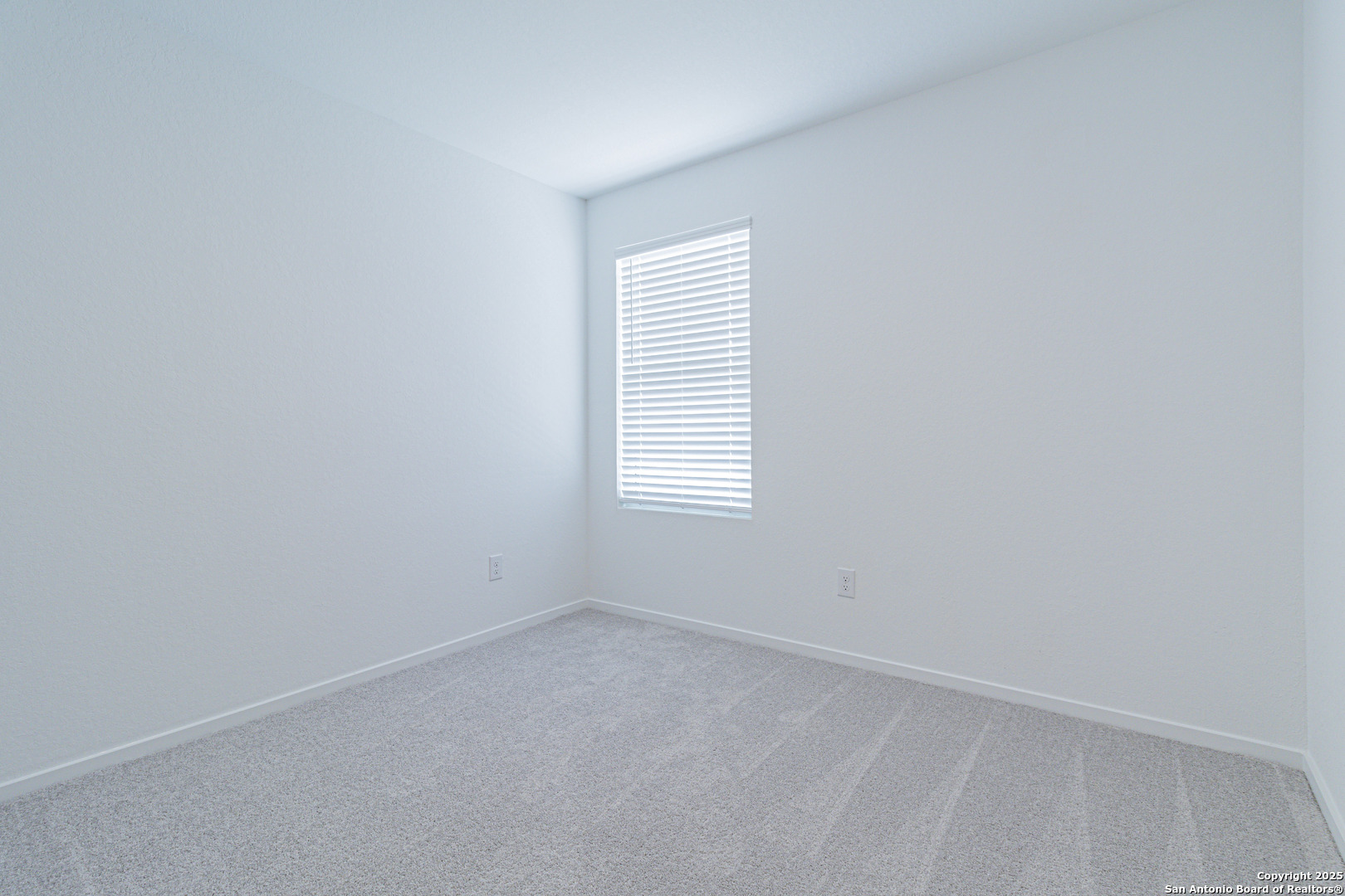 308 Kayden Court Marion, TX 78124 - Photo 20 of 23 an empty room with a window