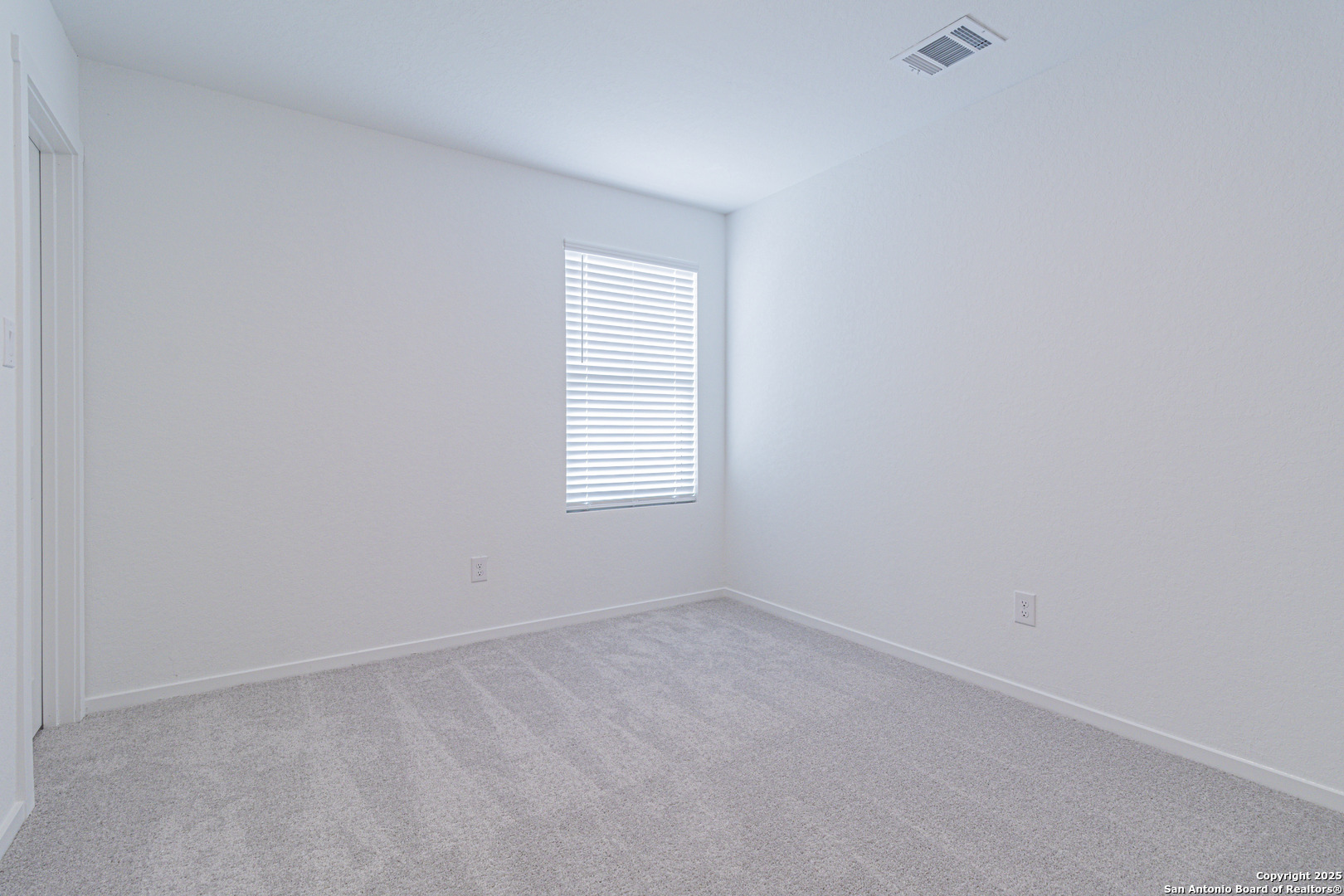 308 Kayden Court Marion, TX 78124 - Photo 23 of 23 an empty room with a window