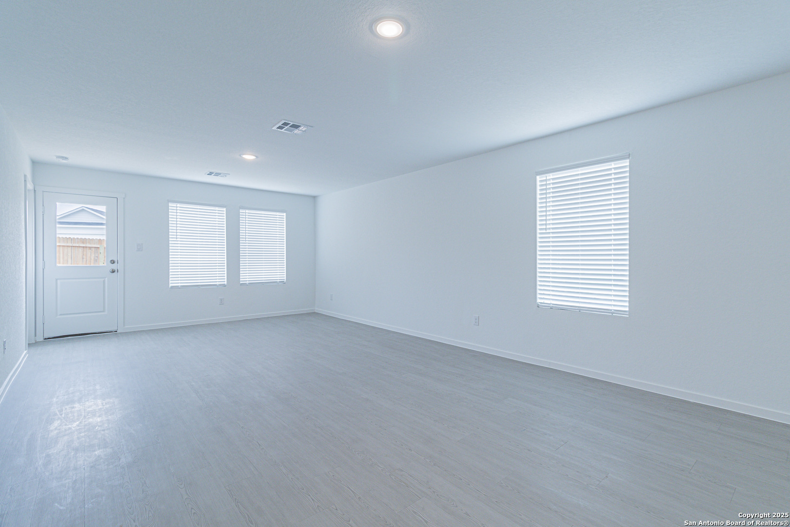 308 Kayden Court Marion, TX 78124 - Photo 7 of 23 an empty room with windows