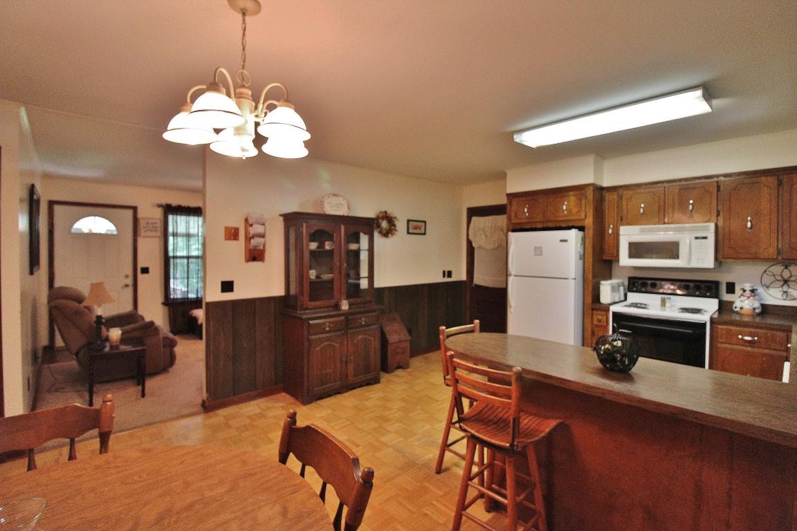 200 East Roddy Road Spring City, TN 37381 - Photo 14 of 41 kitchen into living area (Medium)