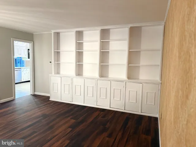 a bathroom with a sink a toilet and vanity
