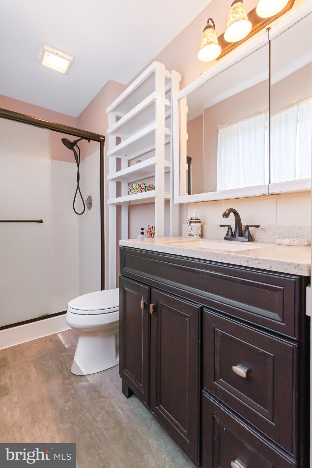 575 Millcross Road Lancaster, PA 17601 - Photo 25 of 47 a bathroom with a sink a toilet and vanity