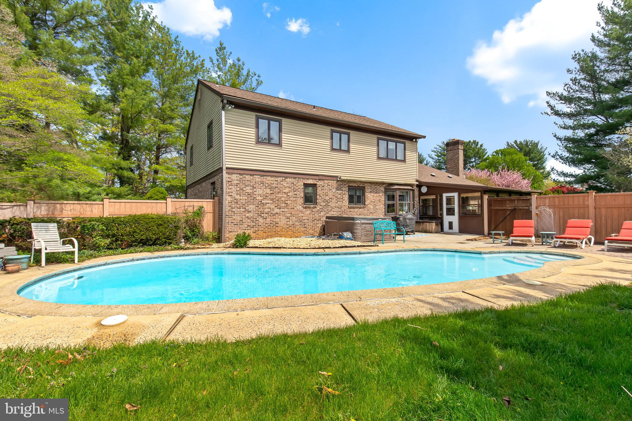 575 Millcross Road Lancaster, PA 17601 - Photo 3 of 47 a front view of a house with swimming pool having outdoor seating