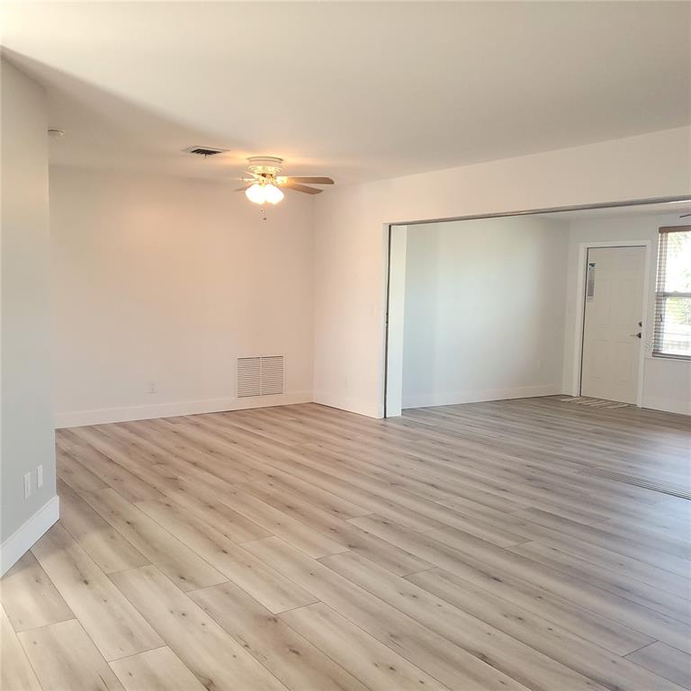 531 Neponsit Drive Venice, FL 34293 - Photo 16 of 37 wooden floor in an empty room