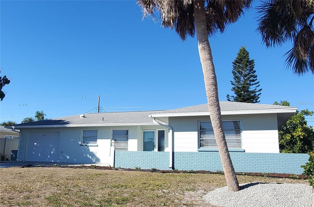 531 Neponsit Drive Venice, FL 34293 - Photo 2 of 37 a front view of a house with a yard