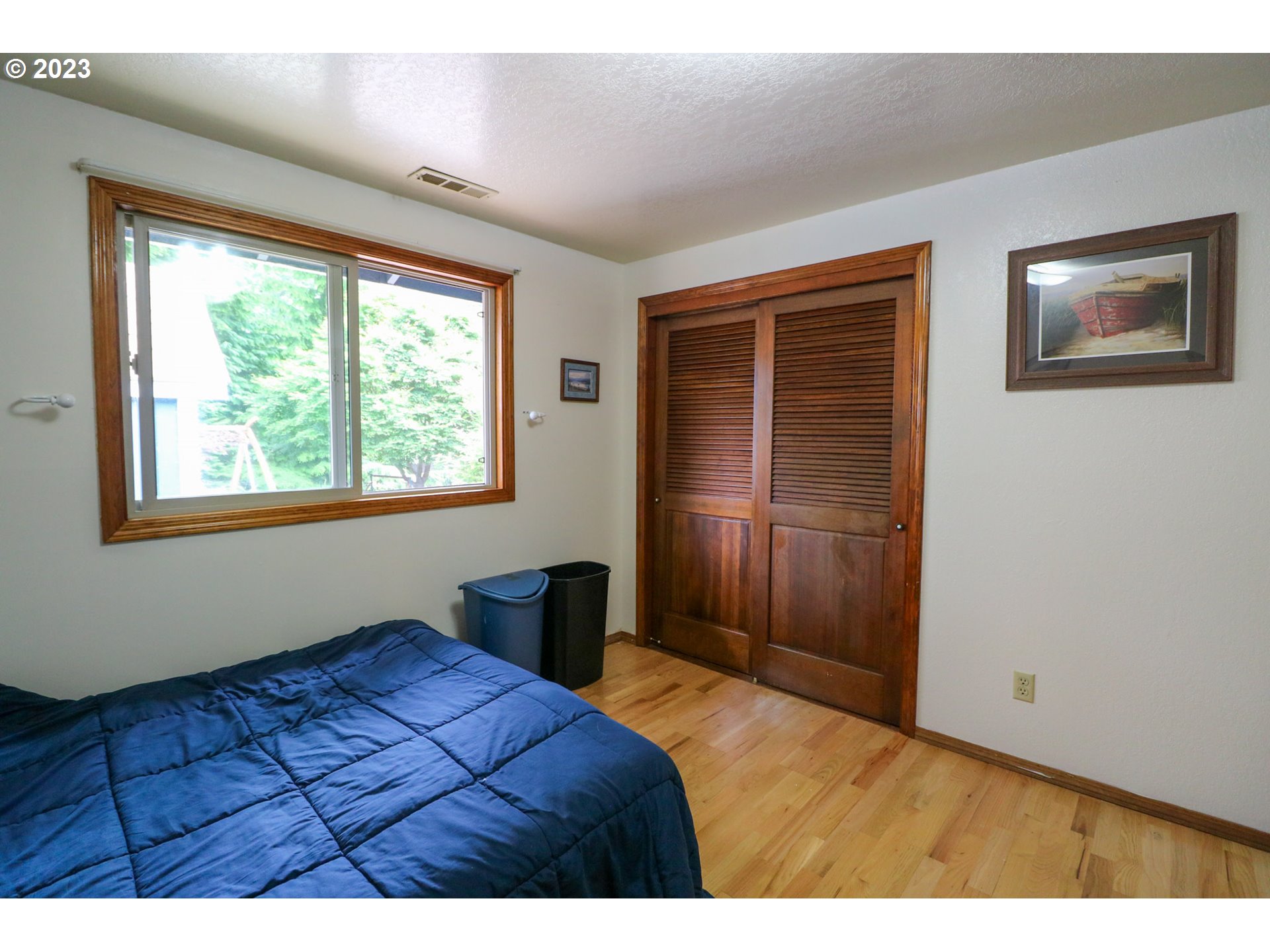 2075 Timberline Drive Coos Bay, OR 97420 - Photo 32 of 39 a bedroom with a bed and a window