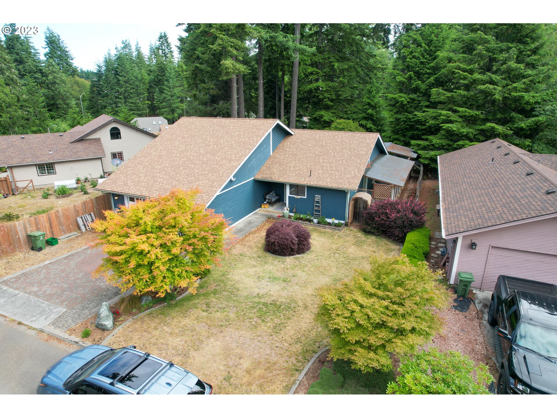 2075 Timberline Drive Coos Bay, OR 97420 - Photo 35 of 39 an aerial view of a house with swimming pool and garden view
