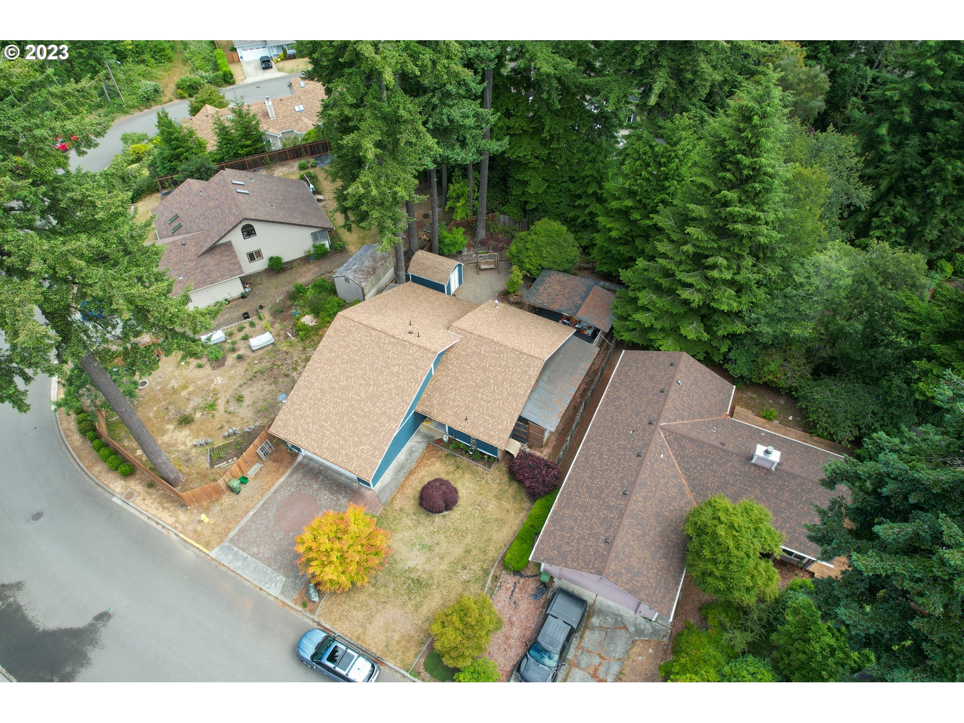 2075 Timberline Drive Coos Bay, OR 97420 - Photo 37 of 39 an aerial view of a house with garden space and street view