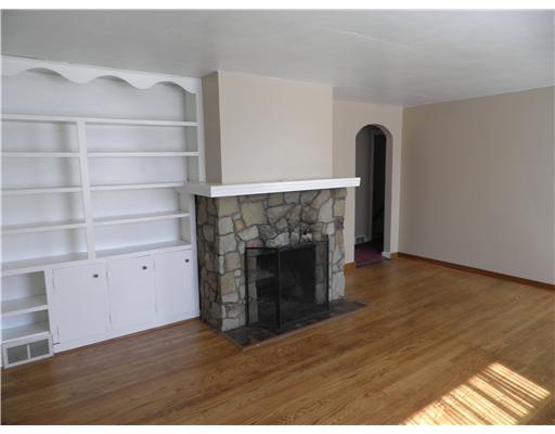 110 Murrysville Road Level Green, PA 15085 - Photo 3 of 16 Living Room. LIVING ROOM BOASTS BUILT IN BOOK SHELVES AND COMPONENT CABINET STORAGE WITH LOVELY HARDWOOD FLOORS.