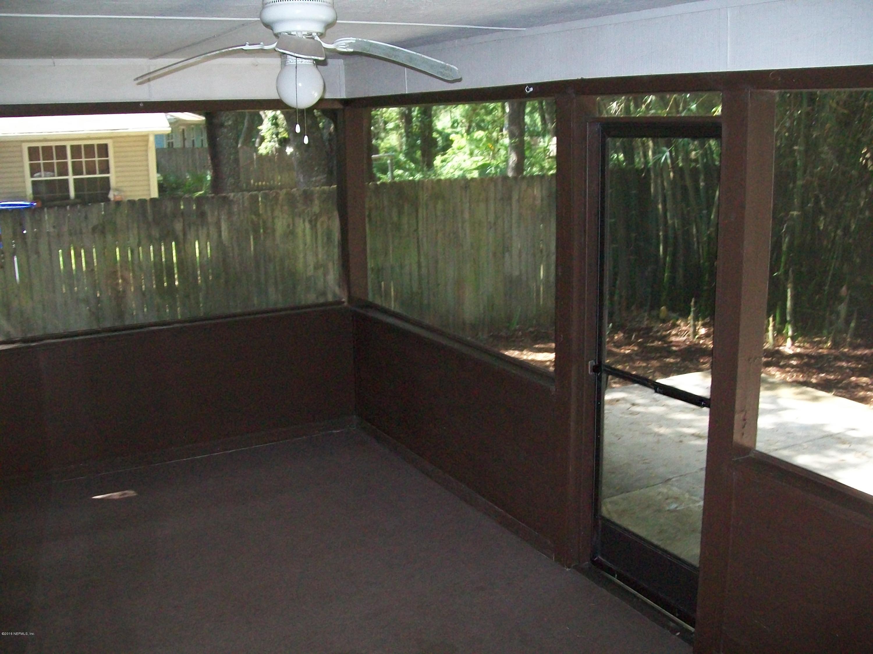 134 Dory Road St. Augustine, FL 32086 - Photo 19 of 25 a room that has a window in it