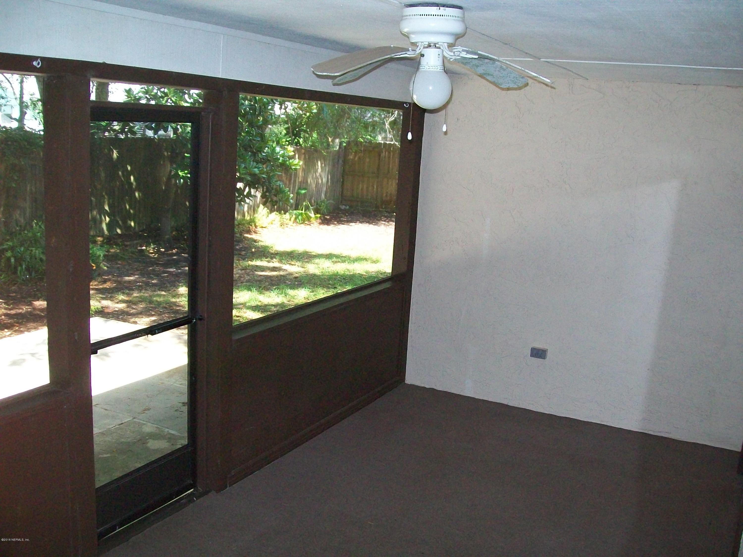 134 Dory Road St. Augustine, FL 32086 - Photo 20 of 25 a view of an empty room with a window