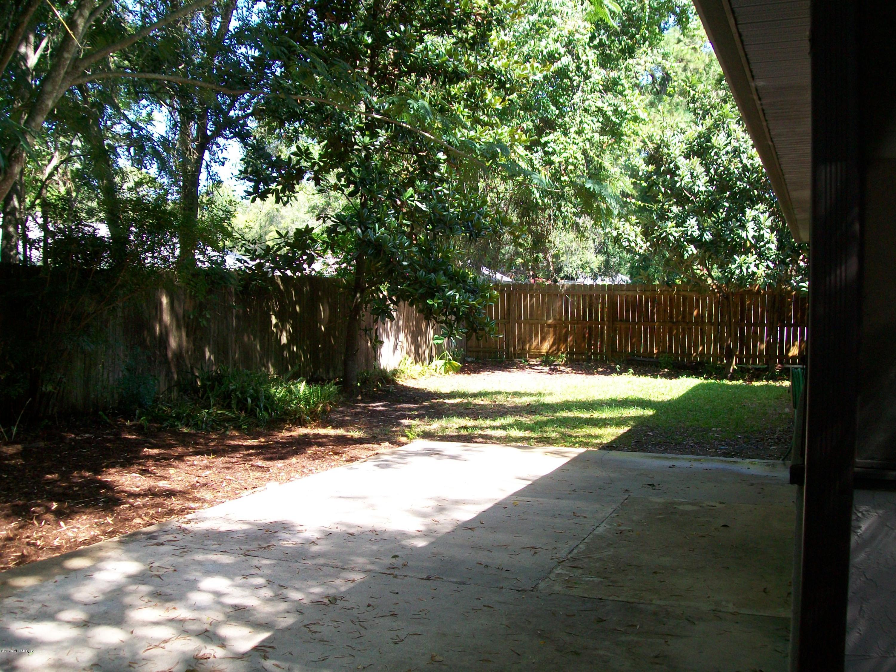 134 Dory Road St. Augustine, FL 32086 - Photo 5 of 25 a view of back yard of the house