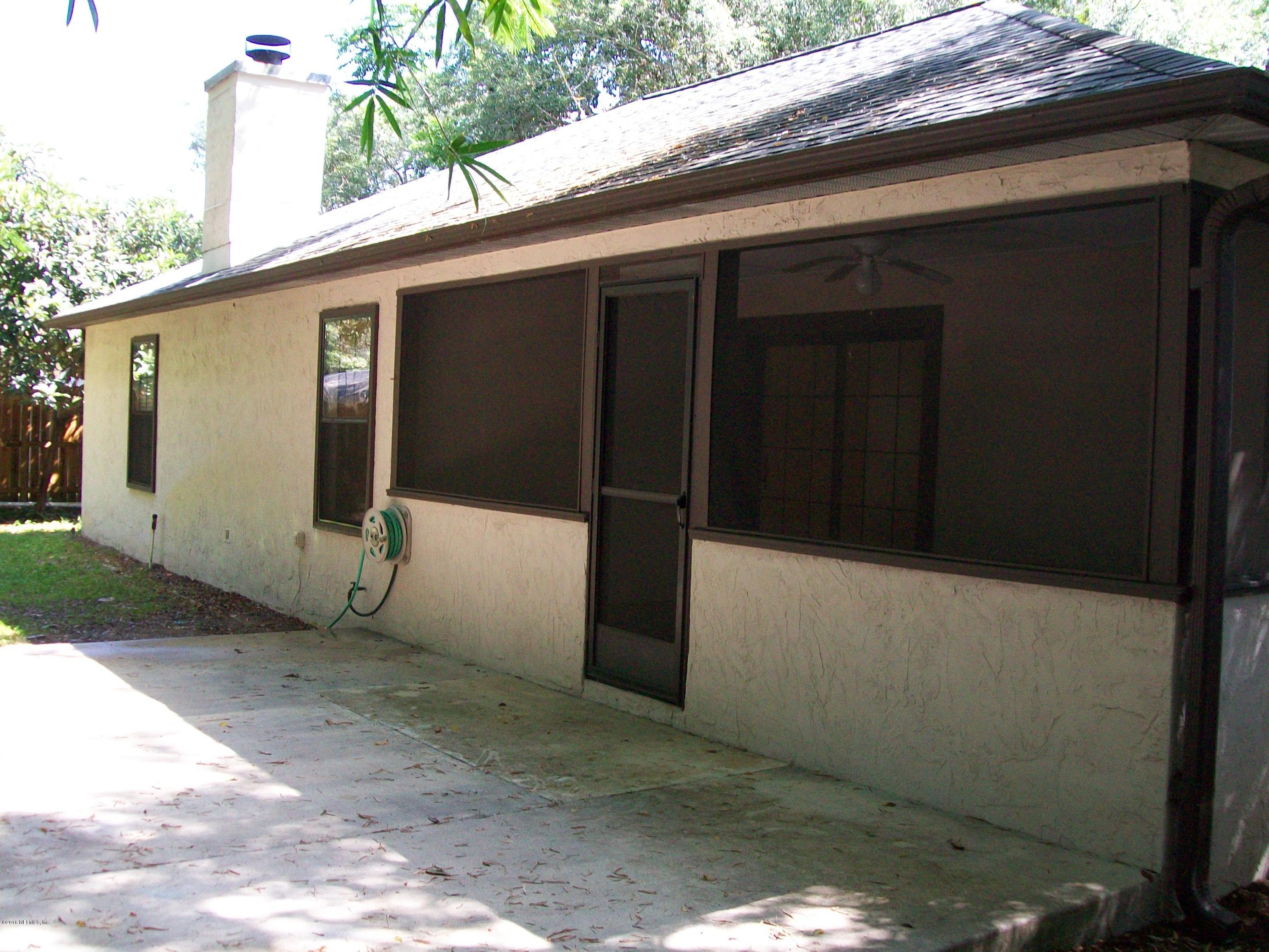 134 Dory Road St. Augustine, FL 32086 - Photo 6 of 25 a backyard of a house