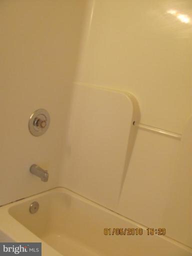 7609 Bull Run Road Manassas, VA 20111 - Photo 11 of 15 a bathroom with a shower