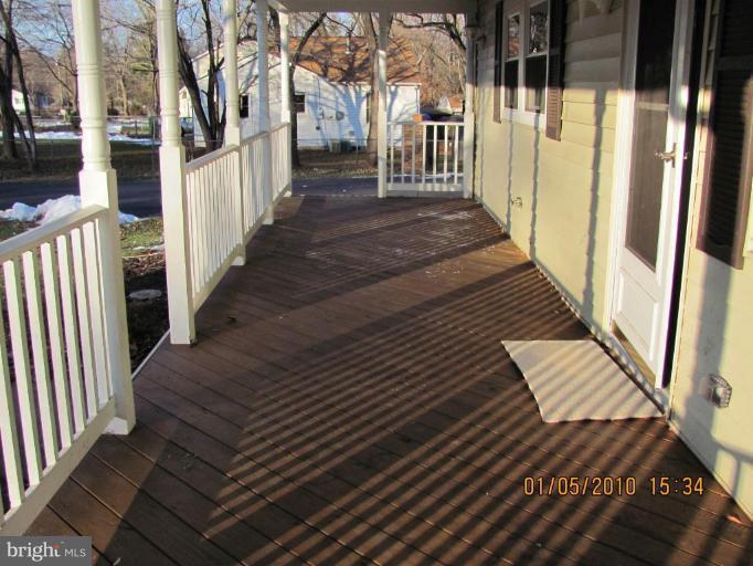 7609 Bull Run Road Manassas, VA 20111 - Photo 13 of 15 a view of a balcony with wooden floor