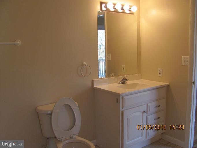 7609 Bull Run Road Manassas, VA 20111 - Photo 9 of 15 a bathroom with a sink and a toilet