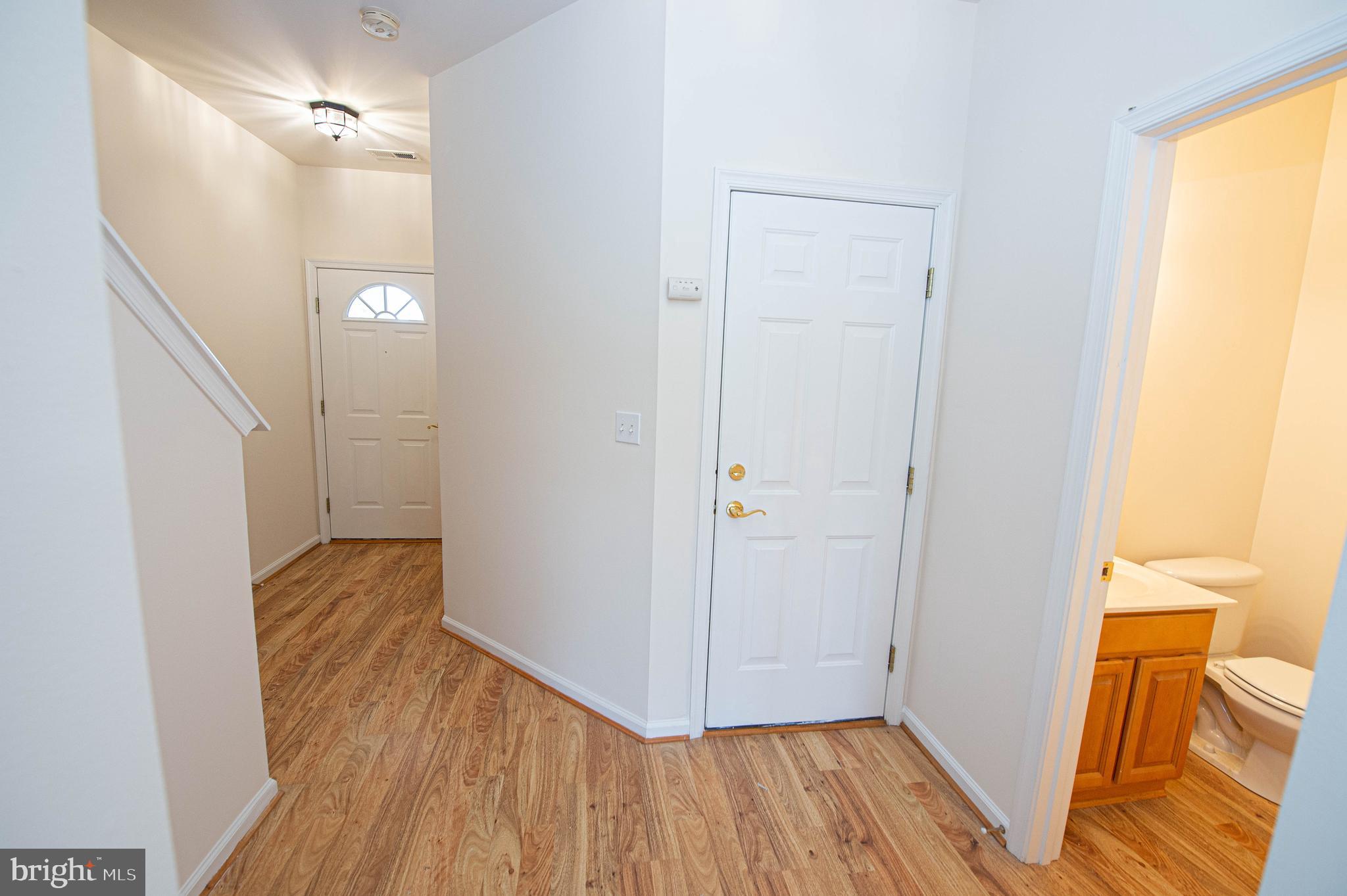 438 Parkview Court, Unit E Salisbury, MD 21804 - Photo 18 of 95 a view of hallway with wooden floor