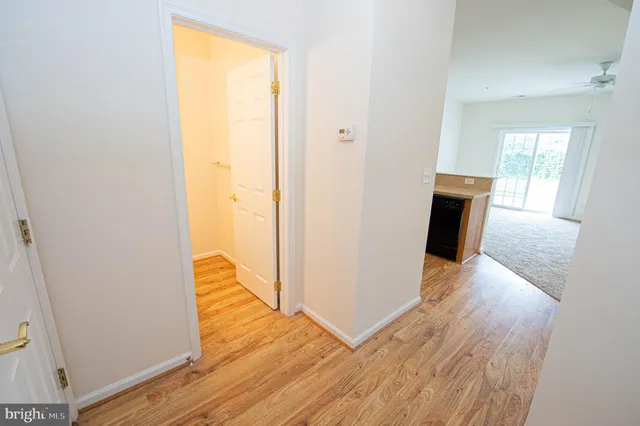 a kitchen with a refrigerator and a stove