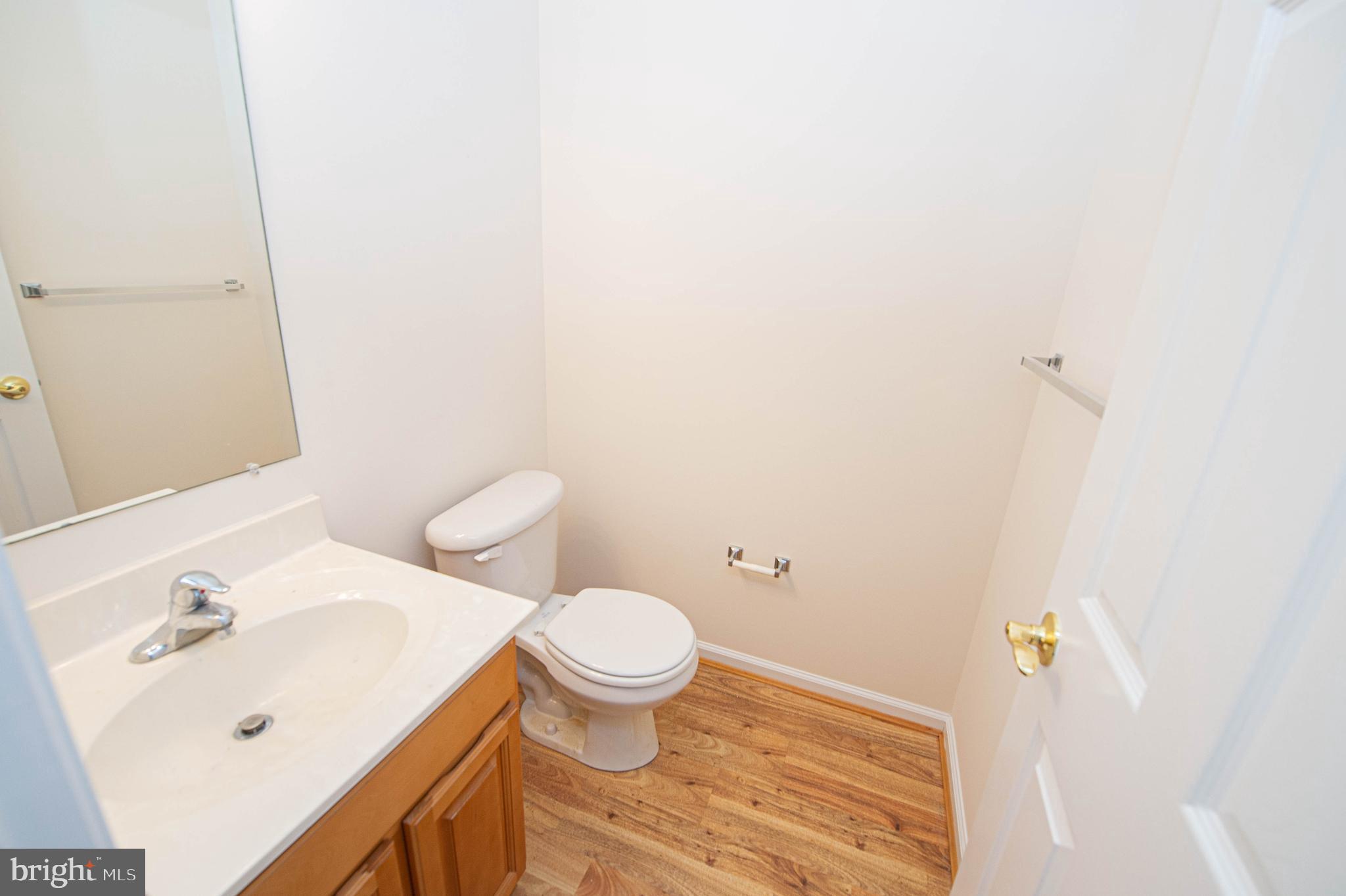 438 Parkview Court, Unit E Salisbury, MD 21804 - Photo 21 of 95 a bathroom with a sink and a toilet